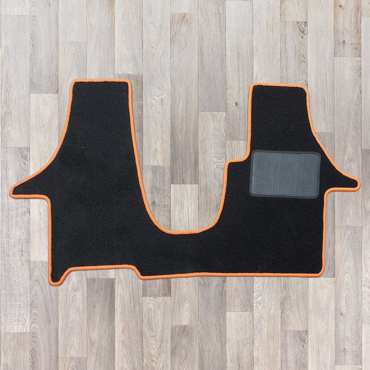 T6 cab mat with 2 plus 1 kiravan swivel seat arrangement shown in black with orange trim