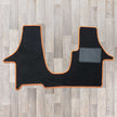 T6 cab mat with 2 plus 1 kiravan swivel seat arrangement shown in black with orange trim