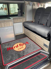 Rectangle rug with Hard Rock Cafe logo in red, yellow and dark grey colours