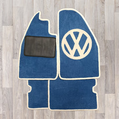 Classic VW Beetle carpet set shown in blue with cream trim and VW logo