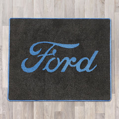 Ford rectangle floor rug 100cm by 80cm shown in black with blue logo and trim