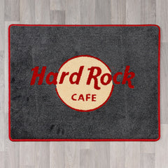 Rectangle rug with Hard Rock Cafe logo in red, yellow and dark grey colours