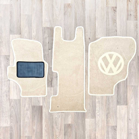 T25 3 piece cab rug set shown in cream carpet with white binding