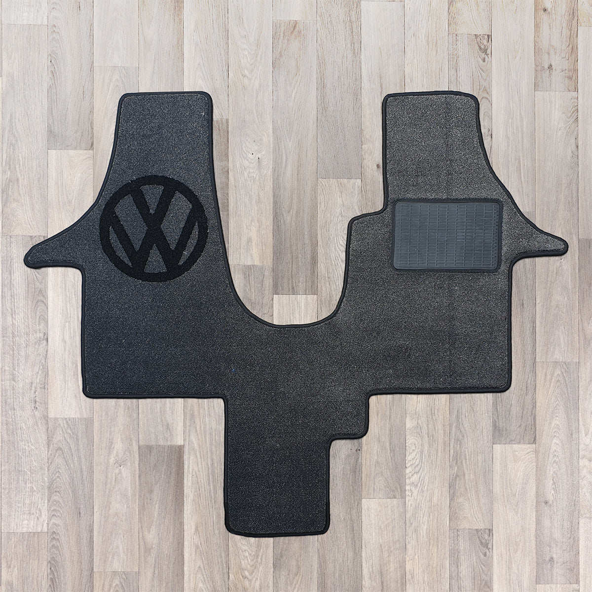 t6 cab rug for 1 plus 1 seat arrangement shown in dark grey and black with VW logo