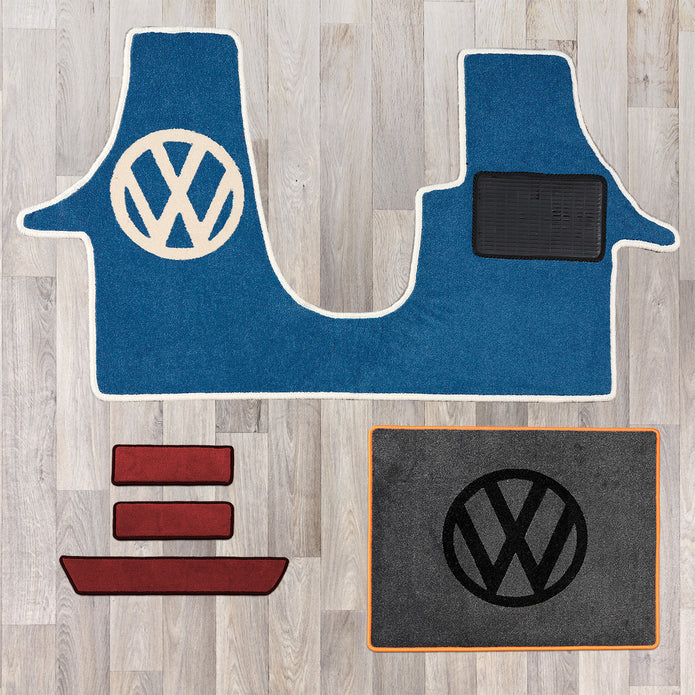 T6 cab mat set including cab mat, side steps, and living area rug