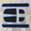 T6.1 December 2019 onwards model door pocket liner set shown in black with blue trim 