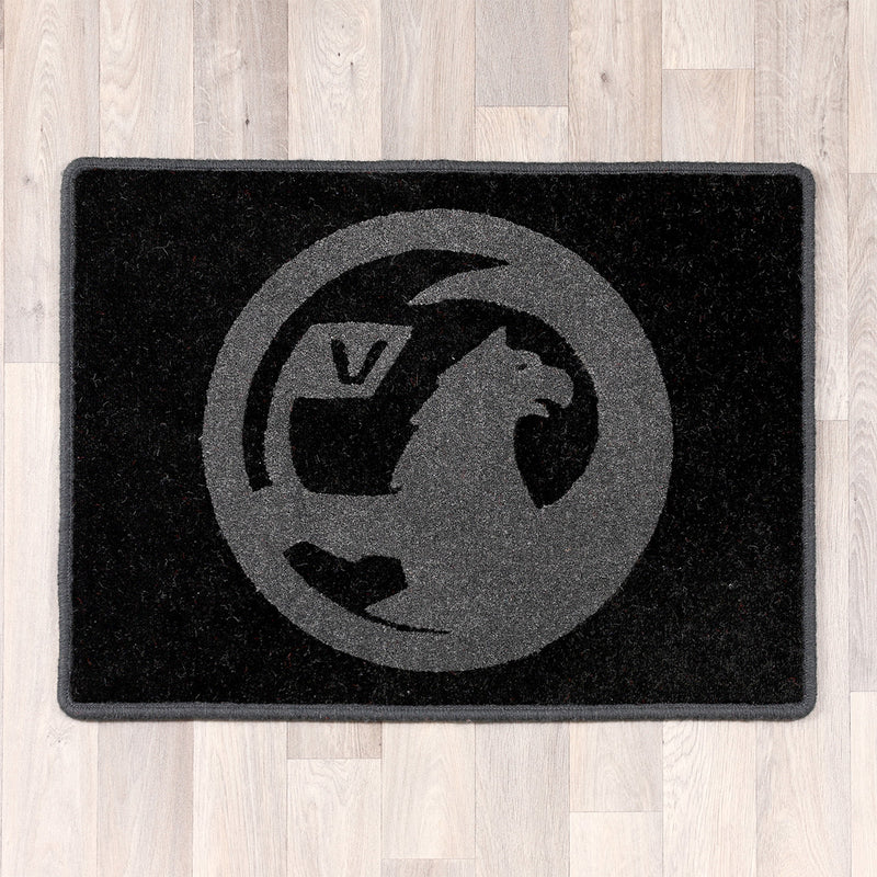 Rectangular rug with Vauxhall logo in light and dark grey colours
