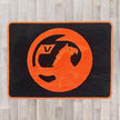 Vauxhall rectangle floor rug shown in black carpet with red binding  Edit alt text