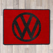 rectangular rug with vw logo in red and black