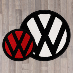 round rug with vw logo in black and red colours